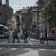 Asylum-seekers cross a street in central Belgrade, a city that has been at the center of smuggling operations in the Balkans and has seen the number of new arrivals increase with the onset of warmer weather.
